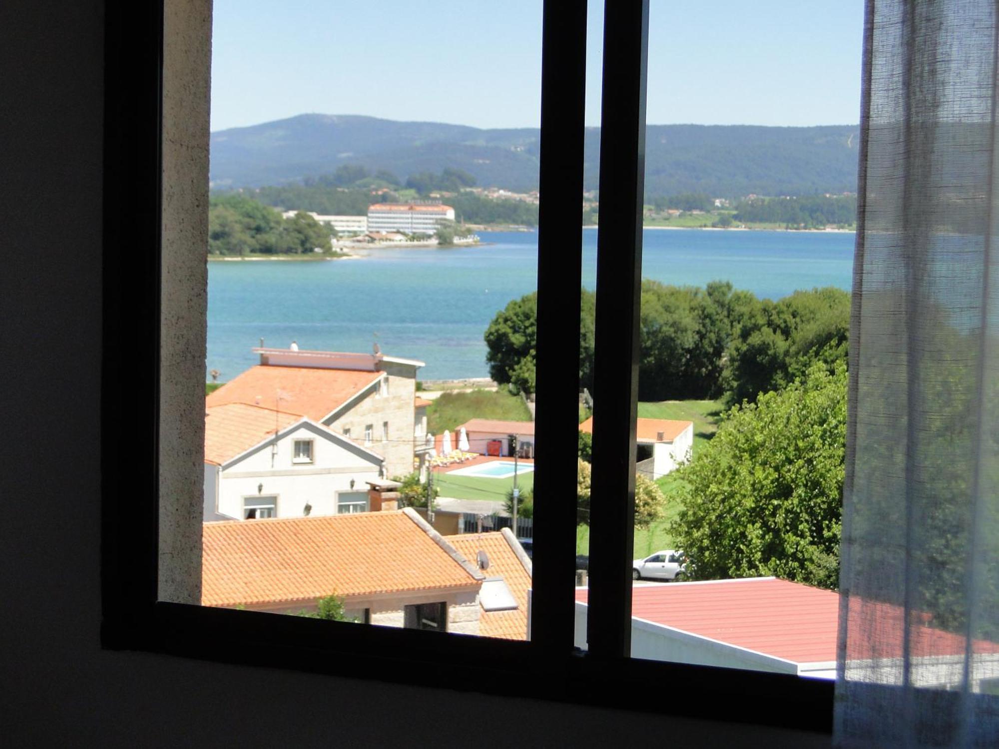 Apartamentos Blanco オ・グローベ エクステリア 写真